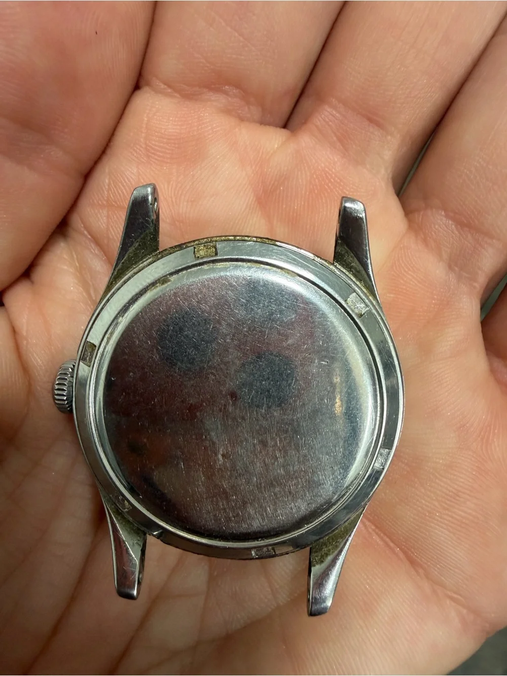 Vintage Omega Silver Case Watch with White Textured Dial